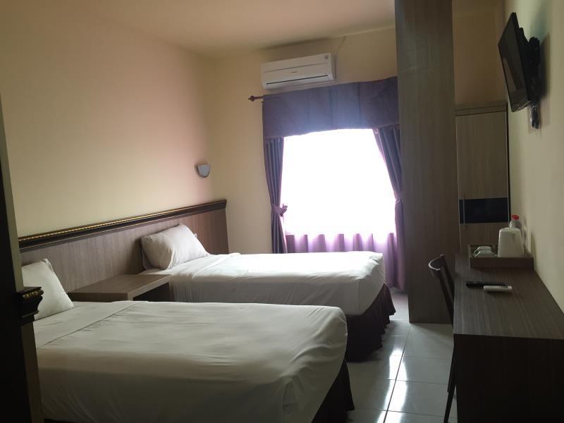 Urbanview Hotel Best Skip Палембанг Екстериор снимка